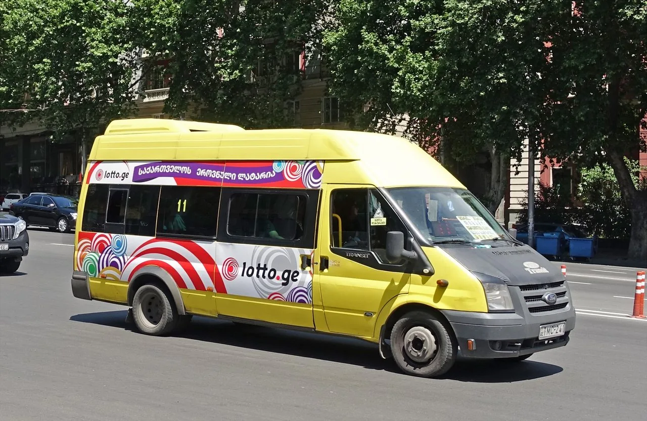 A Georgian marshrutka minibus on a city street
