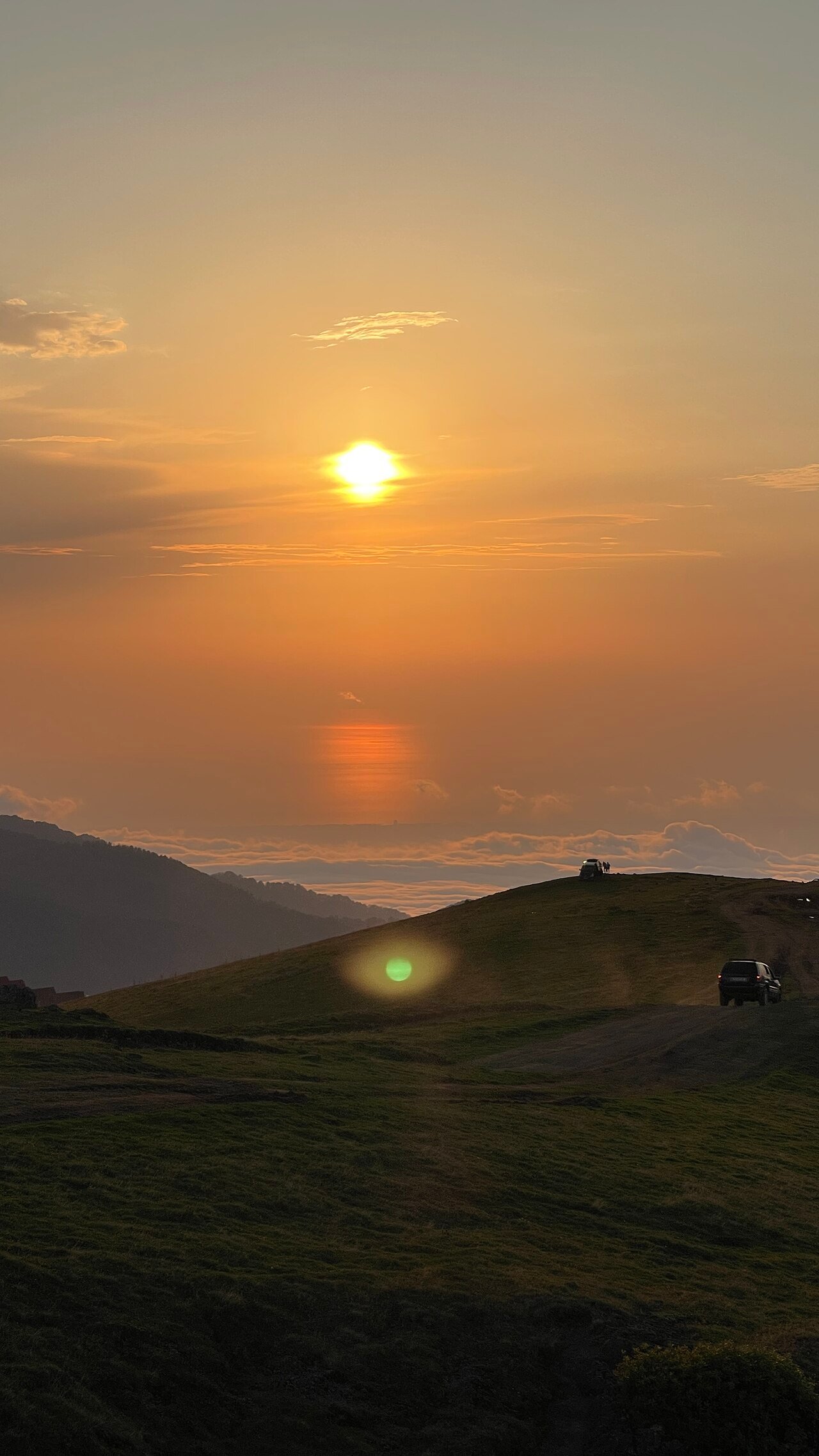 Clouds and sunset viewed from the highland resort of Gomismta
