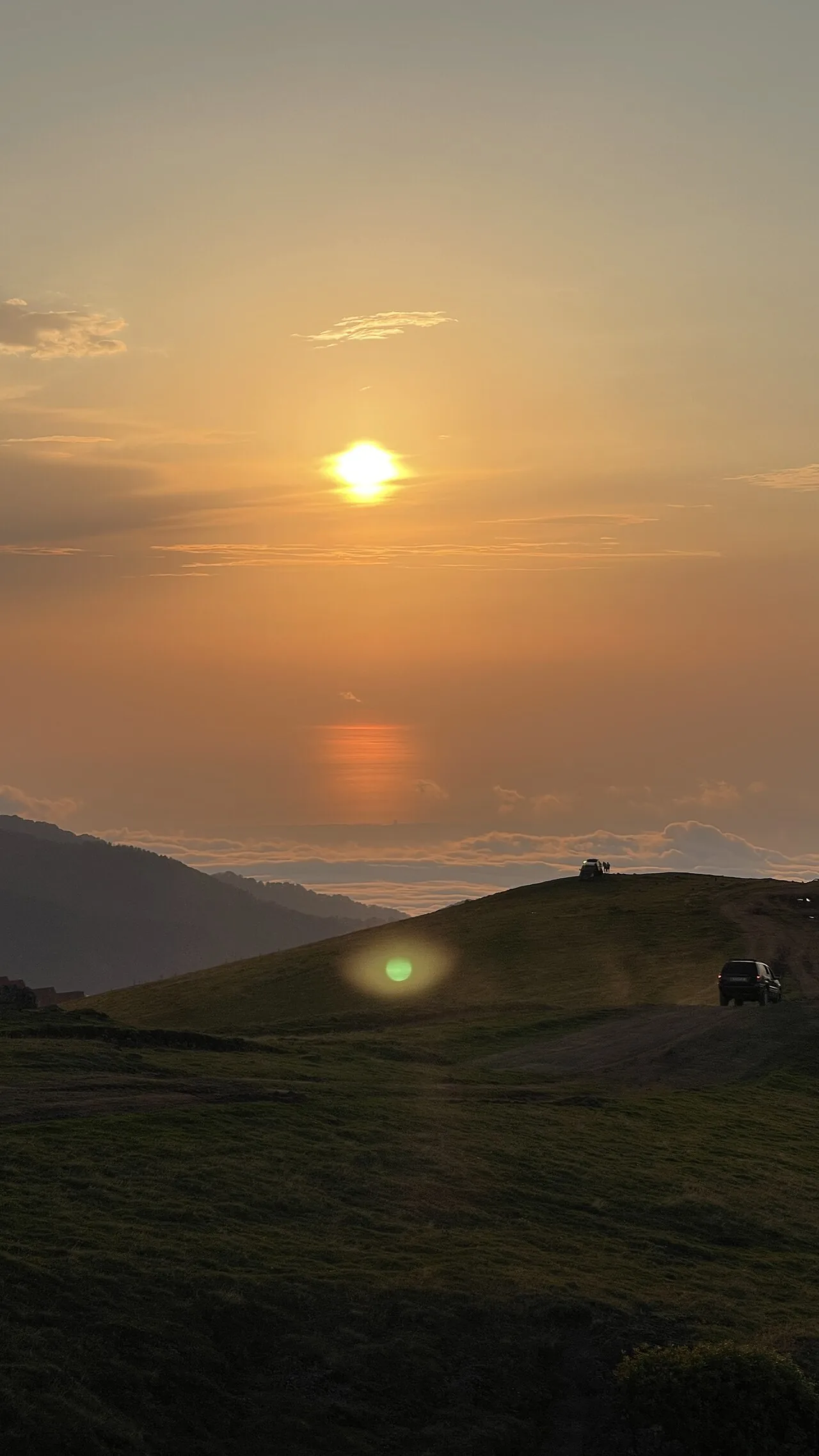 Clouds and sunset viewed from the highland resort of Gomismta